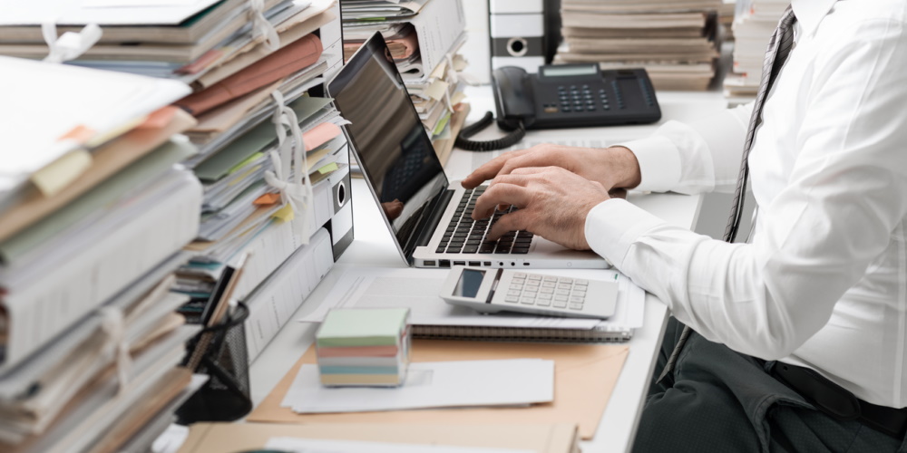 man typing laptop